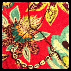 puma shell necklaces